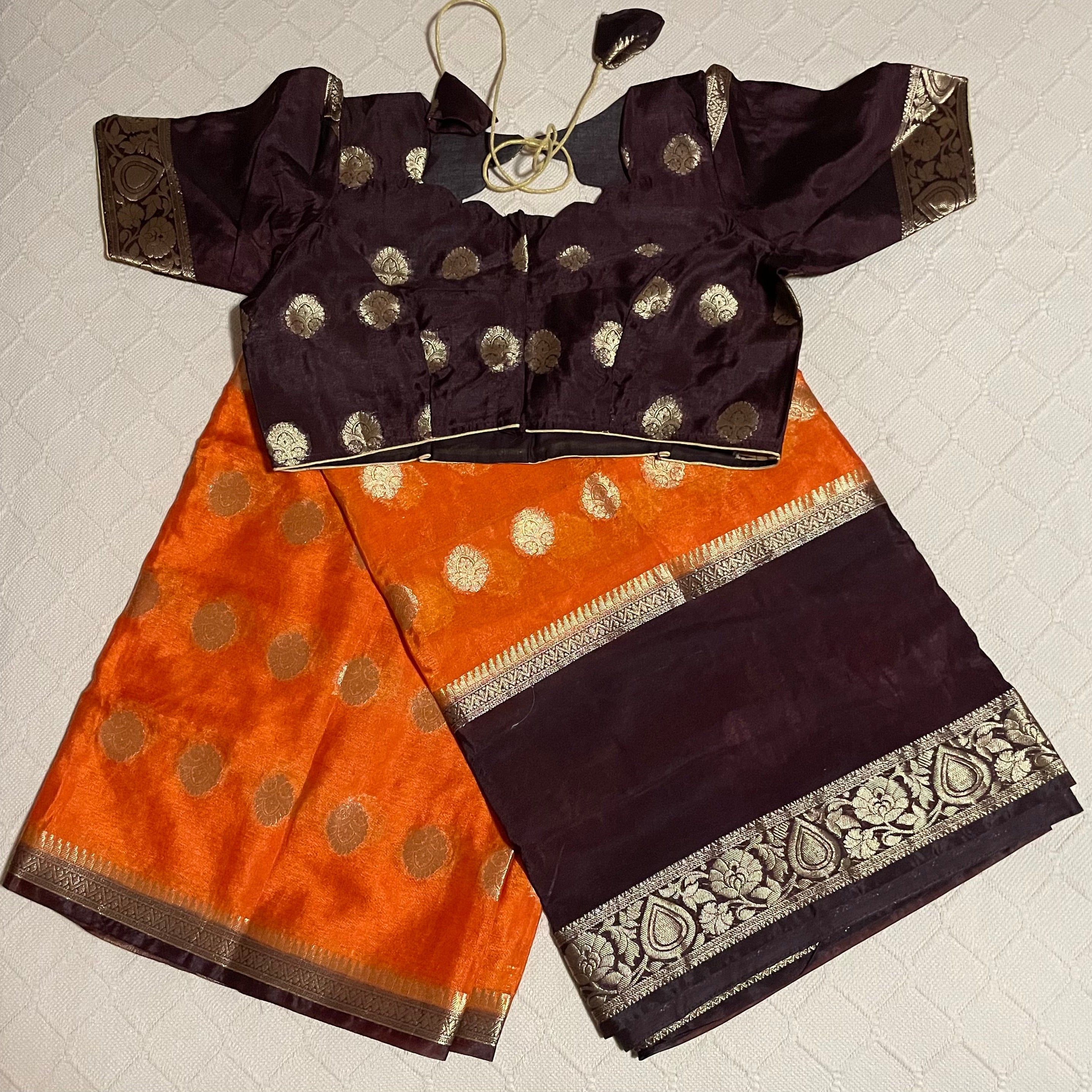 Fancy saree in orange and brown color with ready-to-wear blouse